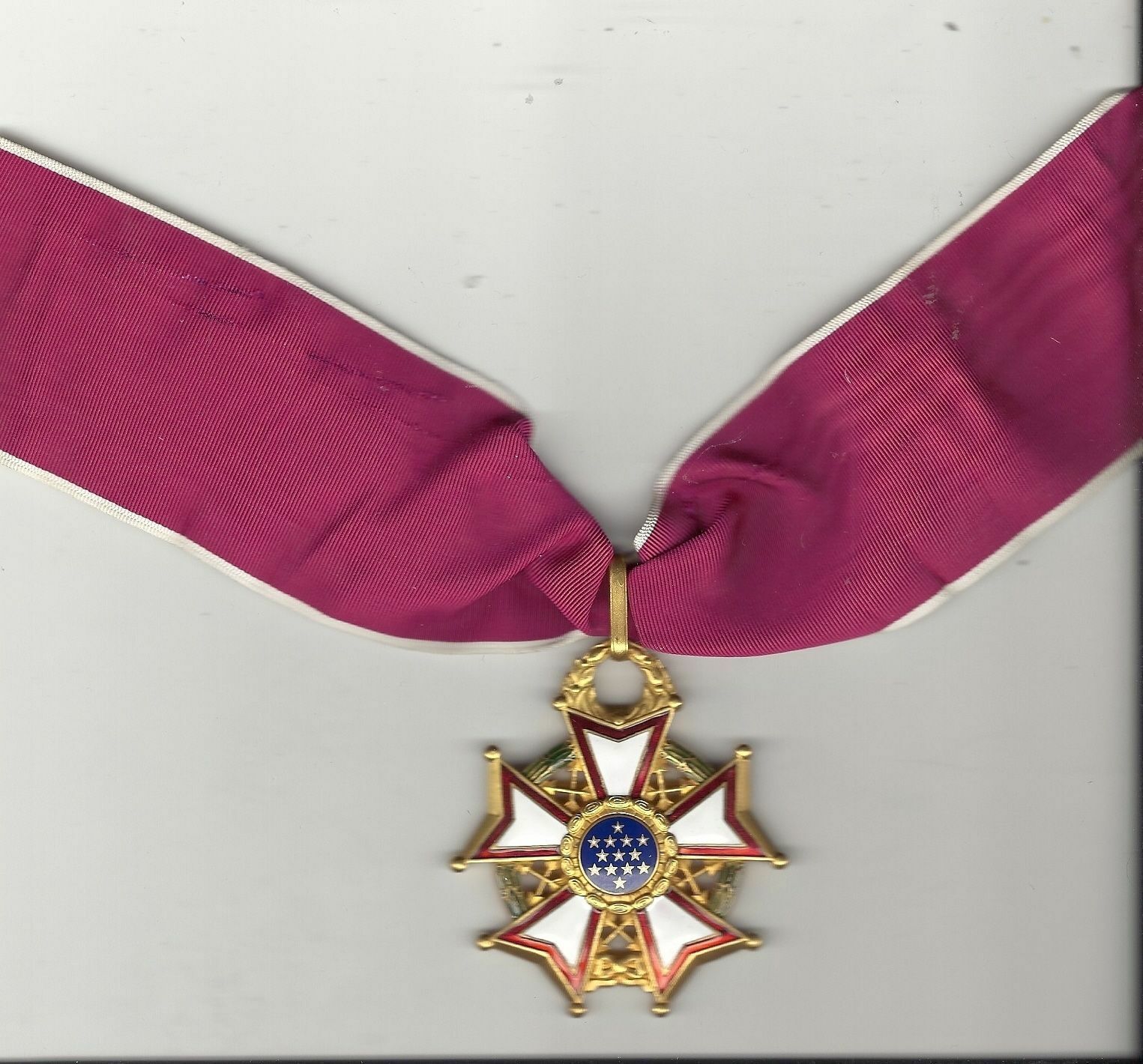 WWII Vintage Genuine Legion of Merit Commander medal on neck ribbon LOM