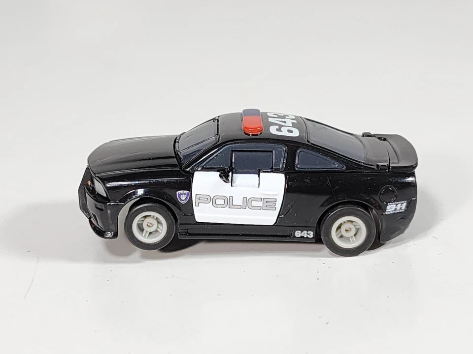 Coche Ranura Eléctrico Hornby Transformers Police Chase Modelo Escala 3" Sin Probar Foto 3 de 4