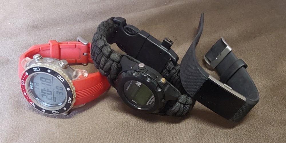 SPORTS WATCH BUNDLE - INCLUDES UNTESTED FITBIT 2 - image 1