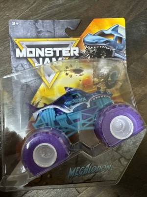 Spin Master 2026 MONSTER JAM   MEGALODON PURPLE Tires Series 2 Kaleidoscope ￼