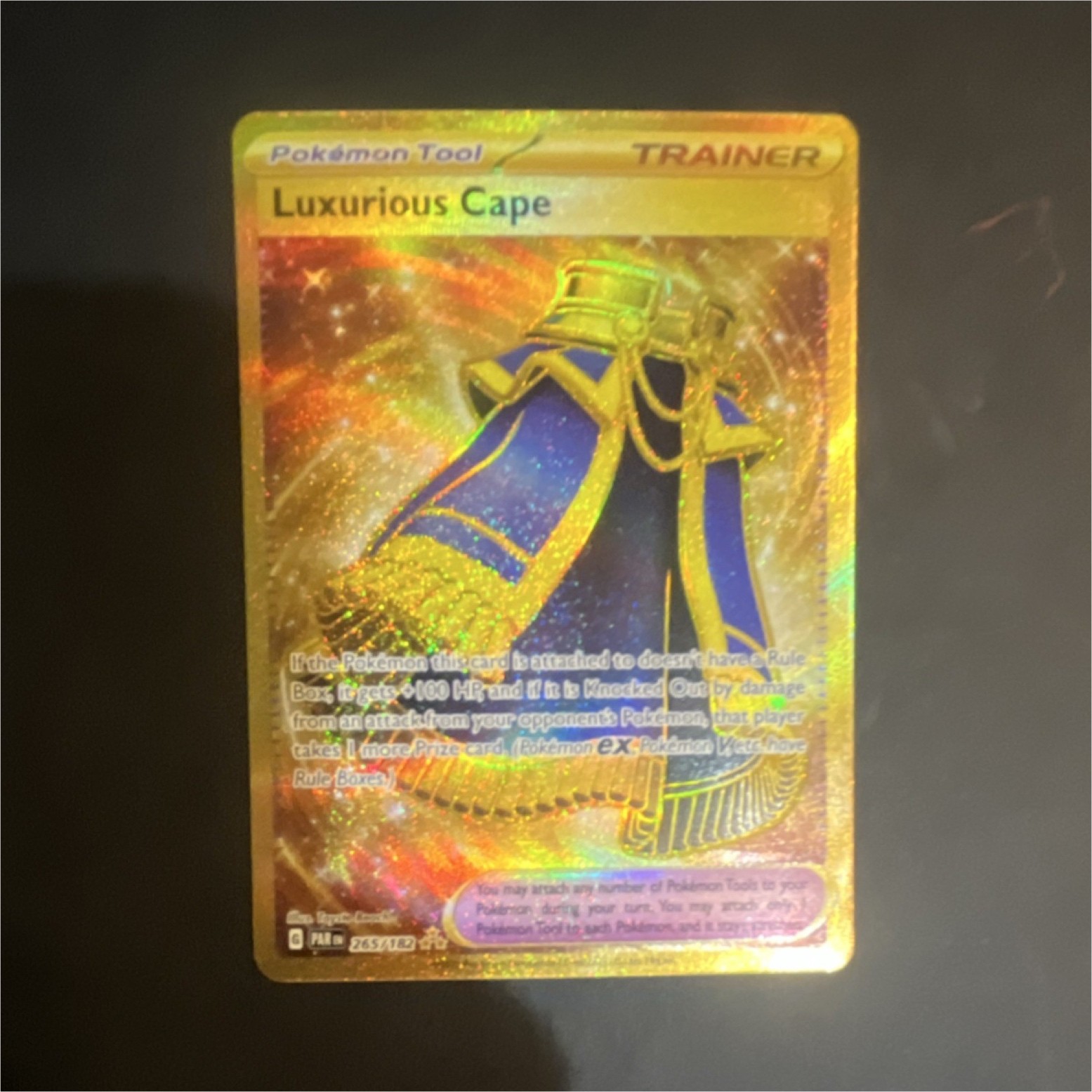 Pokémon Luxurious Cape 265/182 SV04: Paradox Rift Hyper Rare Holo Trainer