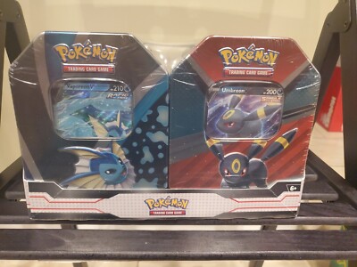 pokémon trading card game vaporeon umbreon tin bundle Amazon.com: 2023 POK Vaporeon Umbreon Tin Bundle : Toys & Games main image 0