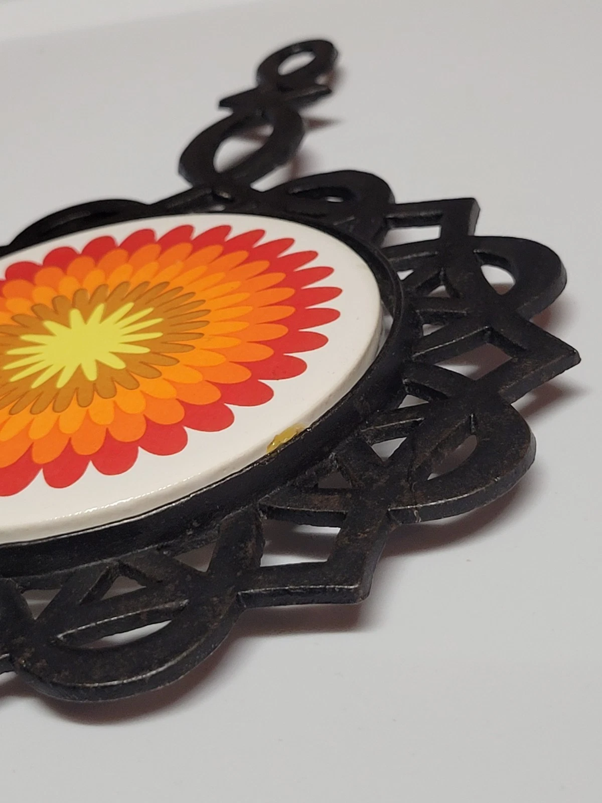 vintage 1970s psychedelic floral cast iron trivet and hot pad - product detail image 8