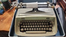 Vintage Mustard Royal Safari typewriter With Case Mid Century Modern thumbnail