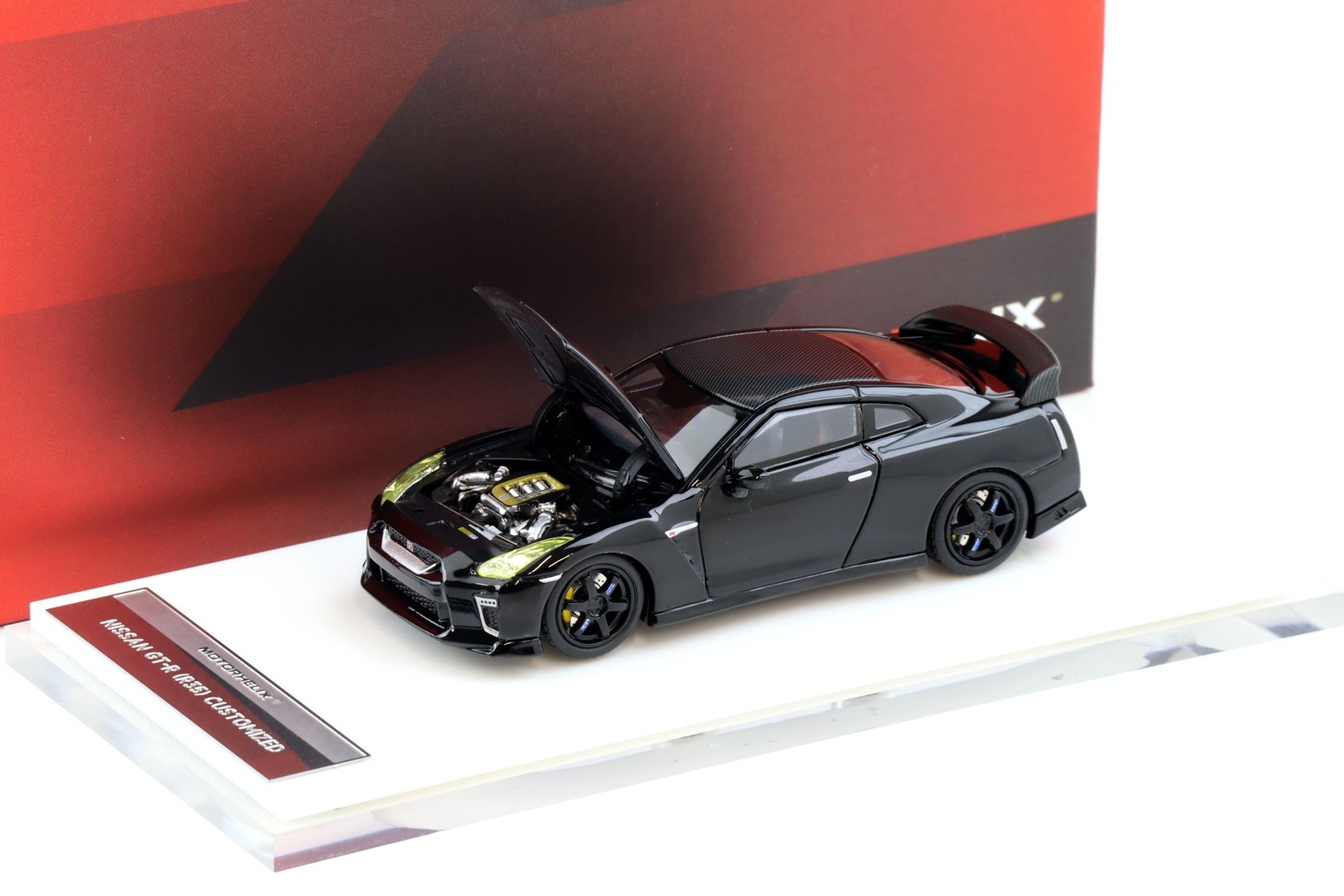 1:64 Motorhelix Nissan GT-R R35 with Customized Headlights black/Carbon