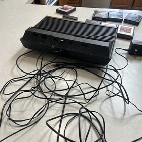 Vintage Atari 2600 Wood grain Console 1980-1982 Working With 8 Games