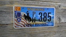 Wyoming Purple Heart Cowboy Bucking Mint license plate Wyoming Hard to find WY!!