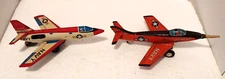 Two Japan Tin Lithographed Friction Powered Navy Fighter Planes