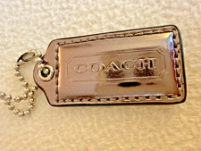 Coach Logo Tag-Metallic Taupe-2"L x 1"W-w/Chain EXC