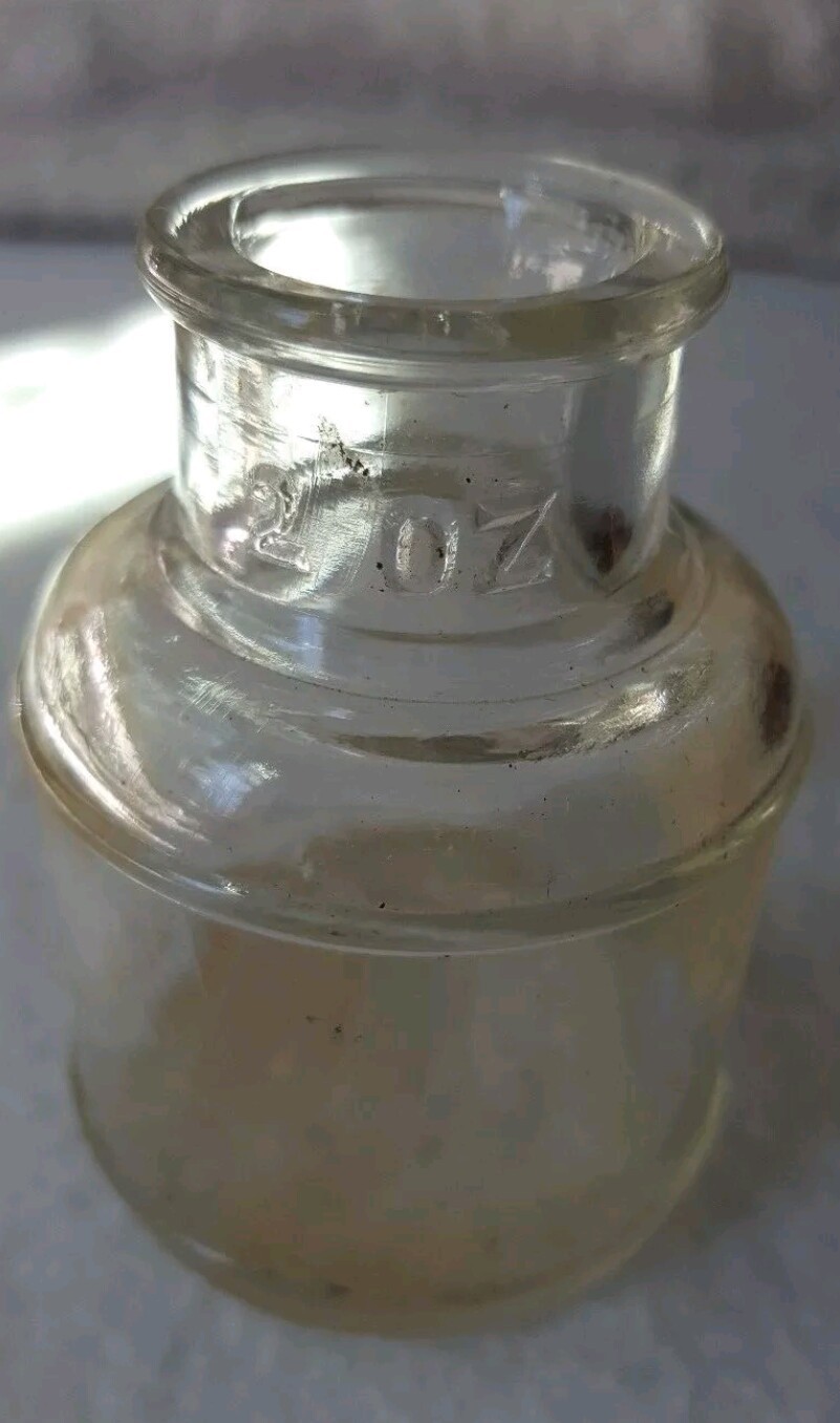 Antique, vintage Sheaffers Skrip inkwell/bottle.  Clear glass. No lid. 2 oz.