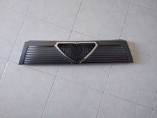 ALFA ROMEO 75 MILANO GRIGLIA MASCHERINA ANTERIORE NUOVA ORIGINALE 1610081025