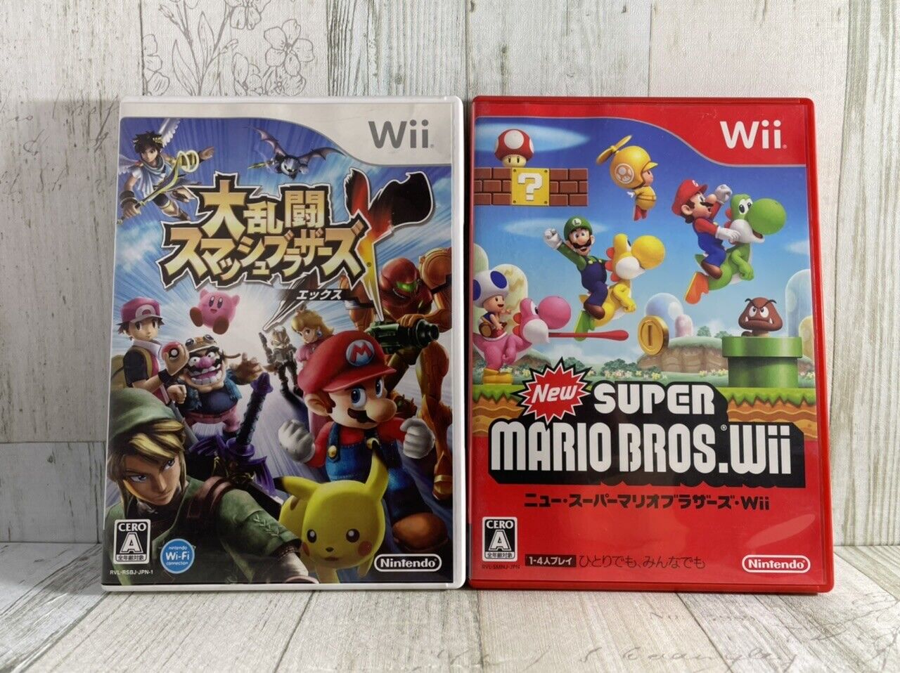 5 Japanese Wii games, Mario Kart, Super Smash Bros, New Super Mario Bros  etc.