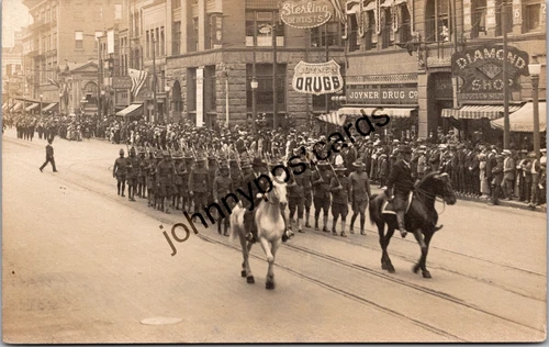 RPPC Postcard WW1 Spokane WA Parade Soldier Military Street Dentist Drug Horse