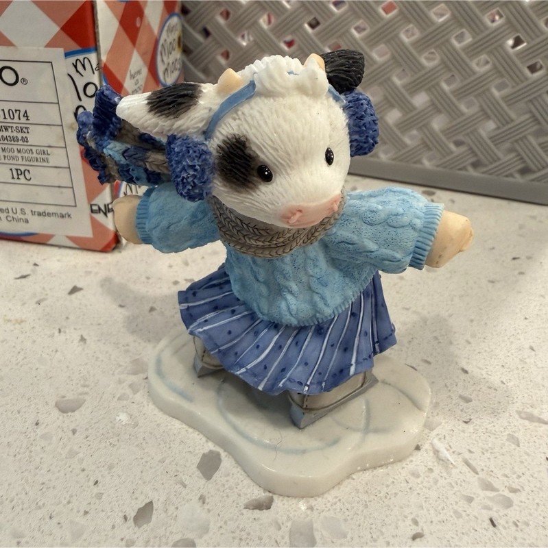 Enesco Mary’s Moo Moos “Skating Into Moo Heart” Cow Figurine