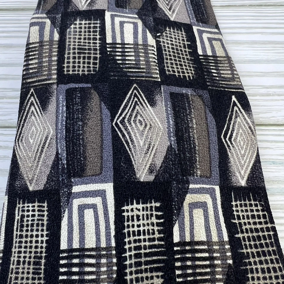 Corbata Henry Grethel 100 % seda italiana para hombre gris negro marfil patrón geométrico Foto 3 de 4