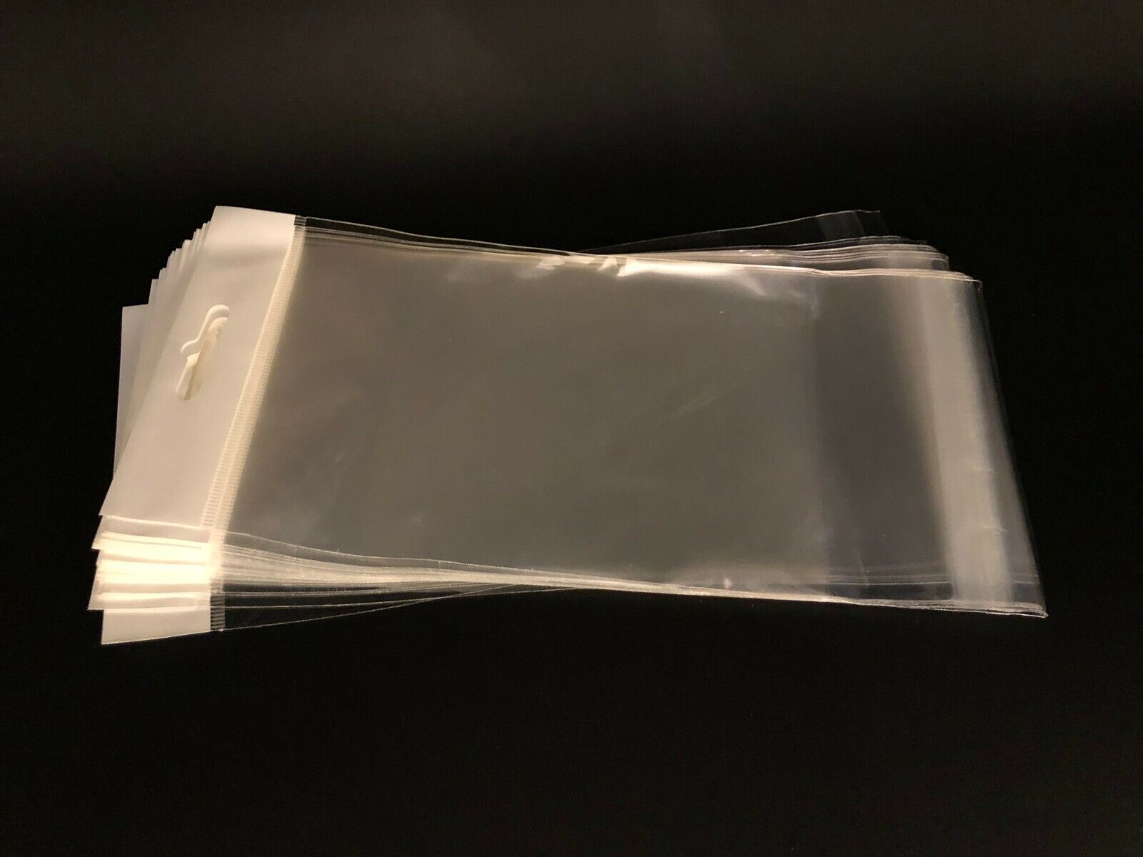100 Clear Cello Bags HANG TOP, Resealable Self Adhesive OPP Poly Hang Hole  bag – Tacos Y Mas