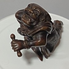 Antique Japanese bronze figure of a kneeling oni figure Meiji period