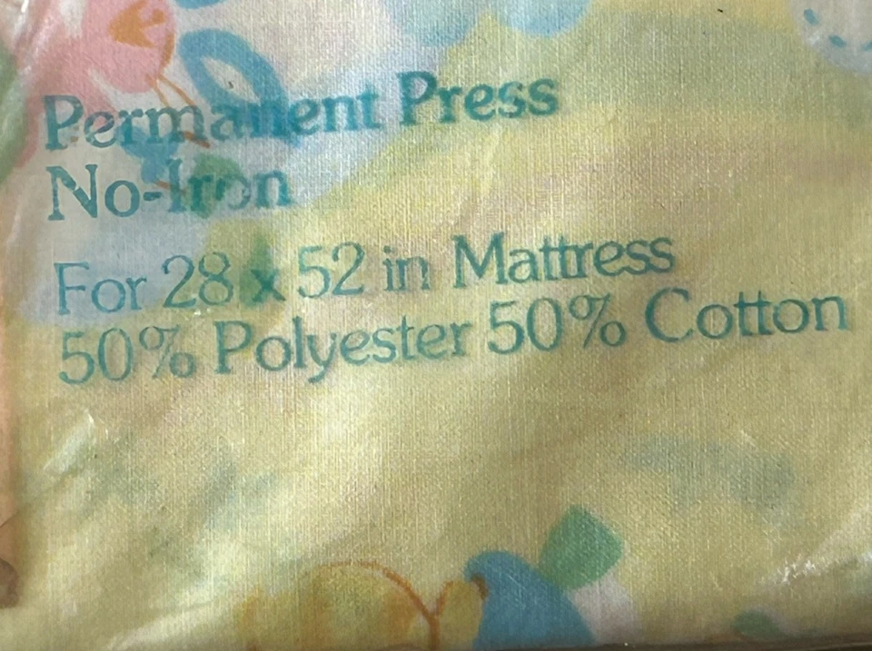 Sábana bajera ajustable CURITY de colección para arco iris de prensa permanente preencogida de 28"x52" Foto 3 de 4