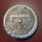 Vintage Art Deco era Gas & Electric stamped metal service badge 1248