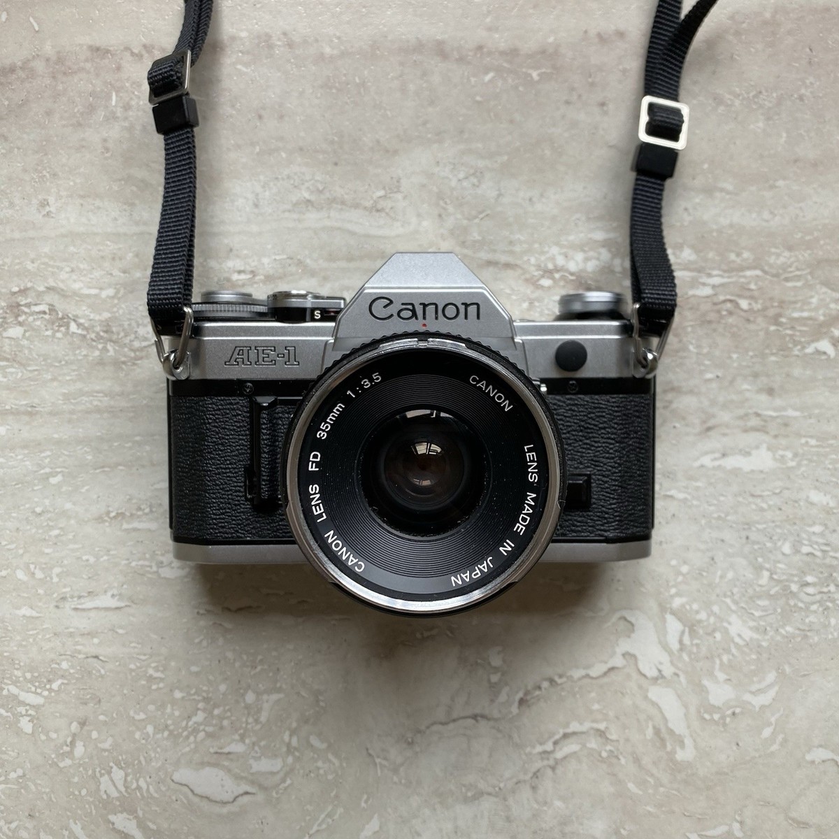 Canon AE-1 35mm SLR Film Camera w/ 35mm Silver Nose FD Lens