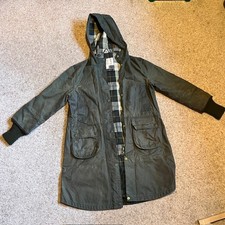 Barbour coat women size 10. Pre-owned, good condition, wax coat with fixed hood.
