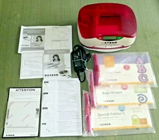 XYRON PERSONAL CUTTING SYSTEM w/POWER CORD, 3 DESIGN BKS,  4 EXTRA MATS, MANUALS