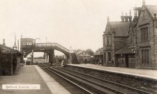 BELFORD, NORTHUMBERLAND. RAILWAY STATION. REAL PHOTO POSTCARD