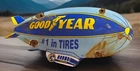 VINTAGE 12” X 5.5” GOODYEAR TIRES PORCELAIN  SALES SERVICE AVIATION BLIMP SIGN