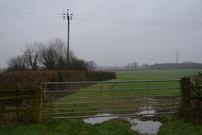 Photo 6x4 Stroud District : Grassy Field & Gate Tumpy Green A gate with a c2017