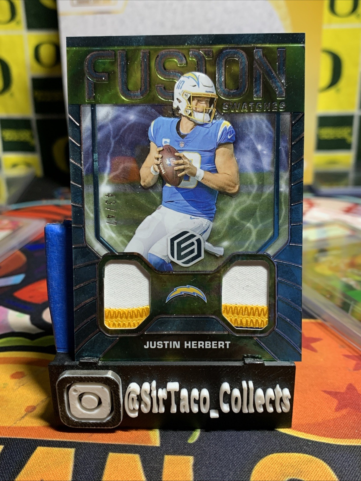 2022 Panini Elements - Fusion Swatches Justin Herbert #FS-17 Blue /47 (MEM)