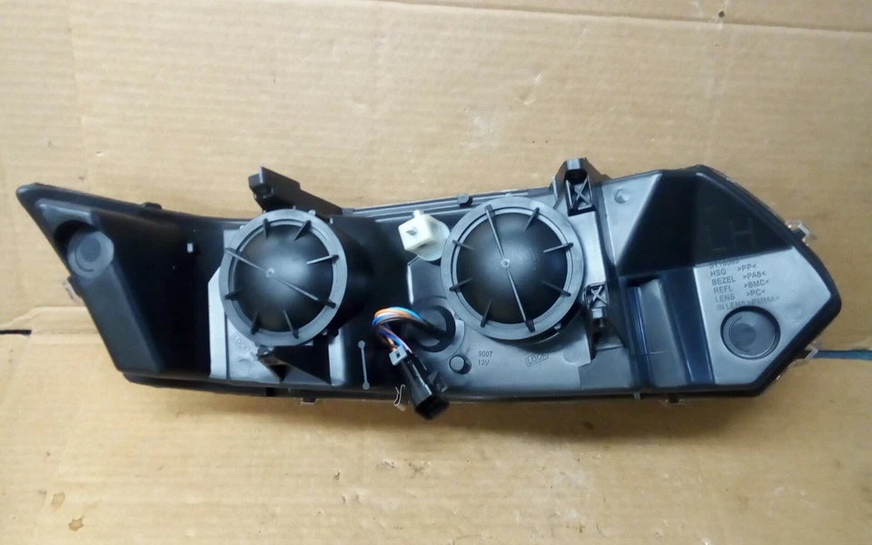 Faro lateral del conductor Saturn Ion 2003 2007 4 puertas nuevo en caja marca Is Vision Foto 2 de 2