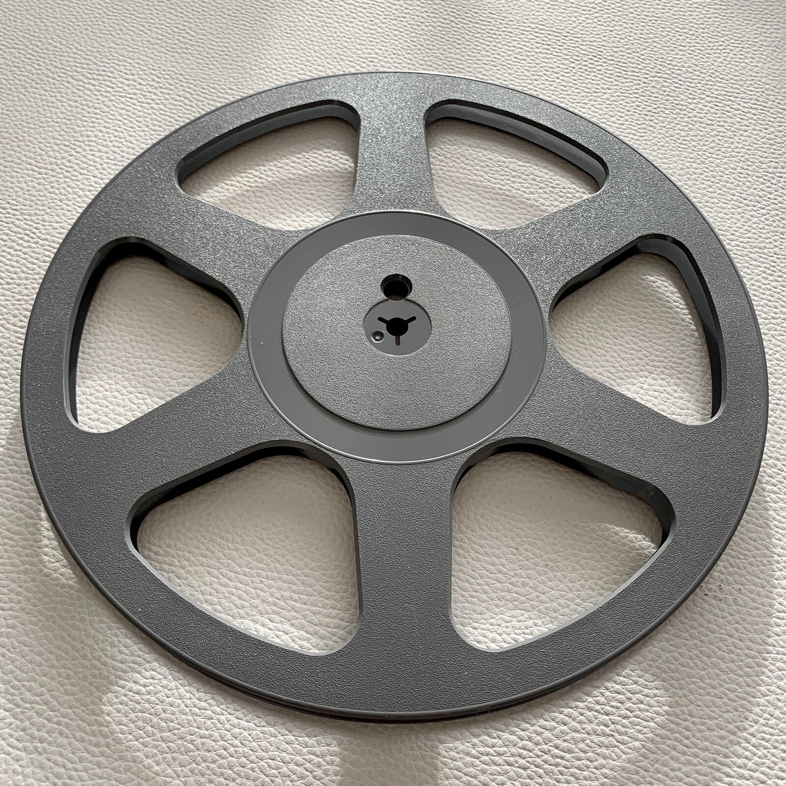 Bobine vide bande 1/4 Posso 27 cm pour éviter les voilages et protéger le son