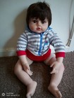 22" baby reborn doll in monkey baby vest and jacket. 