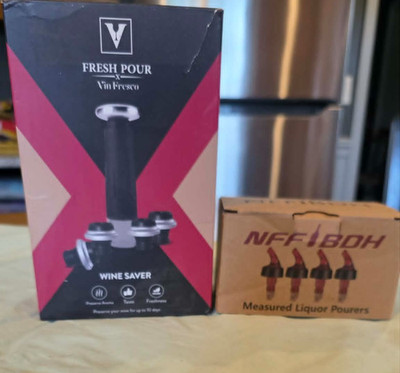 Wine bottle oppener with 4 bottle pourers' 
