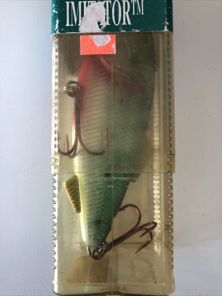 Señuelo imitador Mann's Stretch Plus búnker sangrado pesca vintage LEER Foto 3 de 4