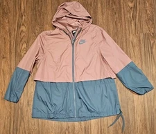 Nike Sportswear Essential Repel Women's Woven Full Zip Hooded Jacket Size Large.