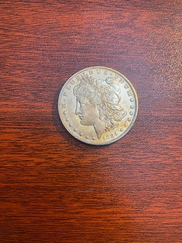 1884-S Morgan $1 – Chest Feathers Variety – AU Circulated