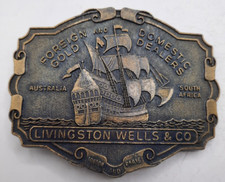 Livingston Wells Co Belt Buckle Foreign and Domestic Gold Dealers 3.75in Vintage