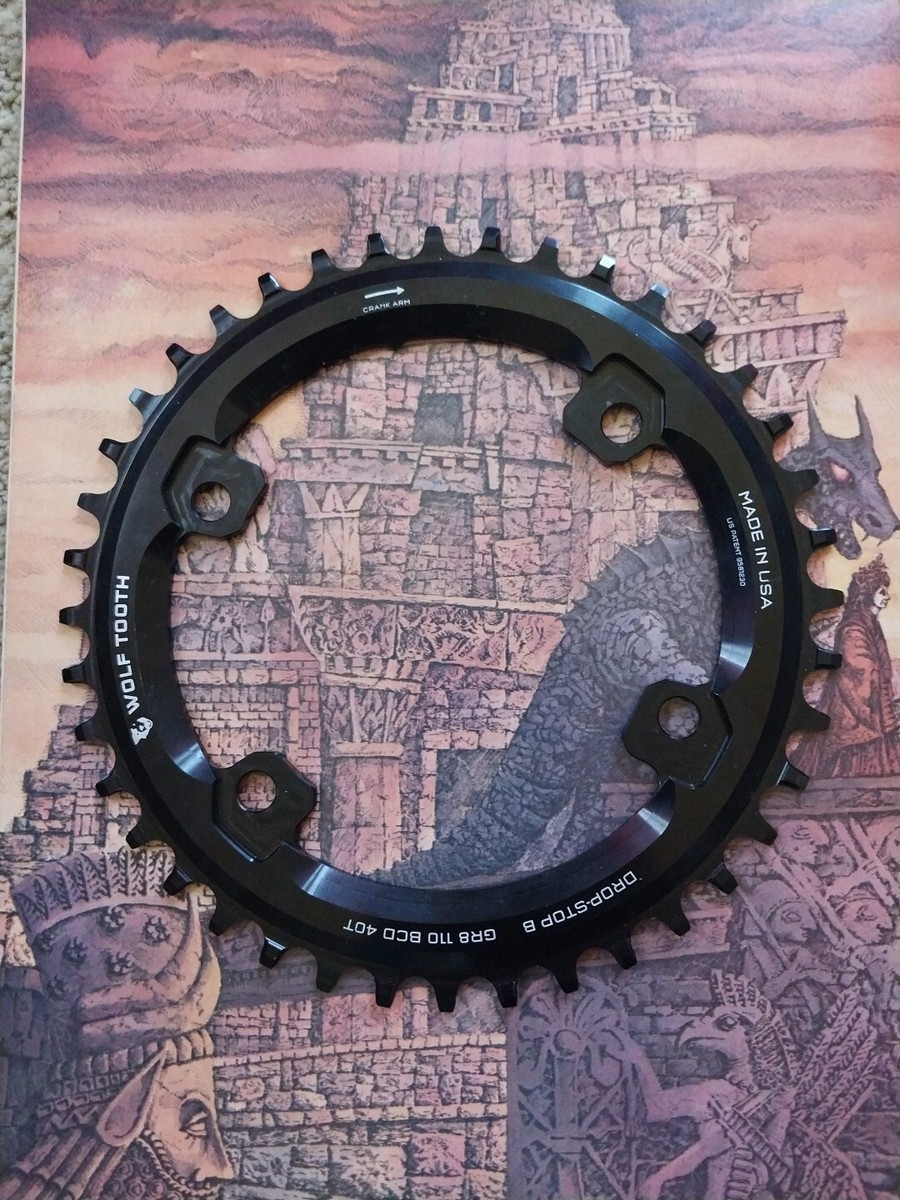 パーツ WOLF TOOTH Drop-Stop Chainring 38 Amazon.com: Wolf Tooth 110 BCD Spider Asymmetric 4-Bolt