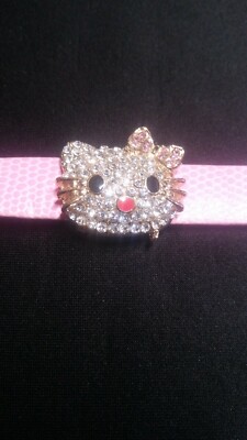 Hello Kitty Head With Rhinestones Pre-owned band is creased but interchangeable