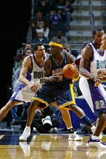 Jermaine O'Neal Indiana Pacers posts up v Dan Gadzuric Milwaukee - 2002 Photo
