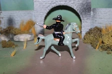 BARCLAY LEAD TOY COWBOY "BLACK BART" BANDIT ON HORSE SHOOTING BACKWARDS-1940