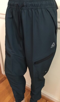 NWT Reebok Men Woven Pant SLIM Taper Athletic Pant  2 Zip Leg Pockets Green XL