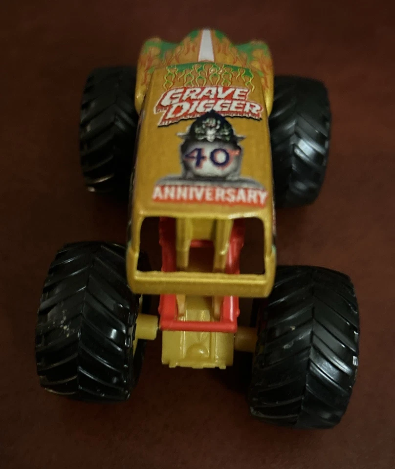 GOLD Spin Master Monster Jam 40th Anniversary Grave Digger Truck 1:64 New - image 4 of 4