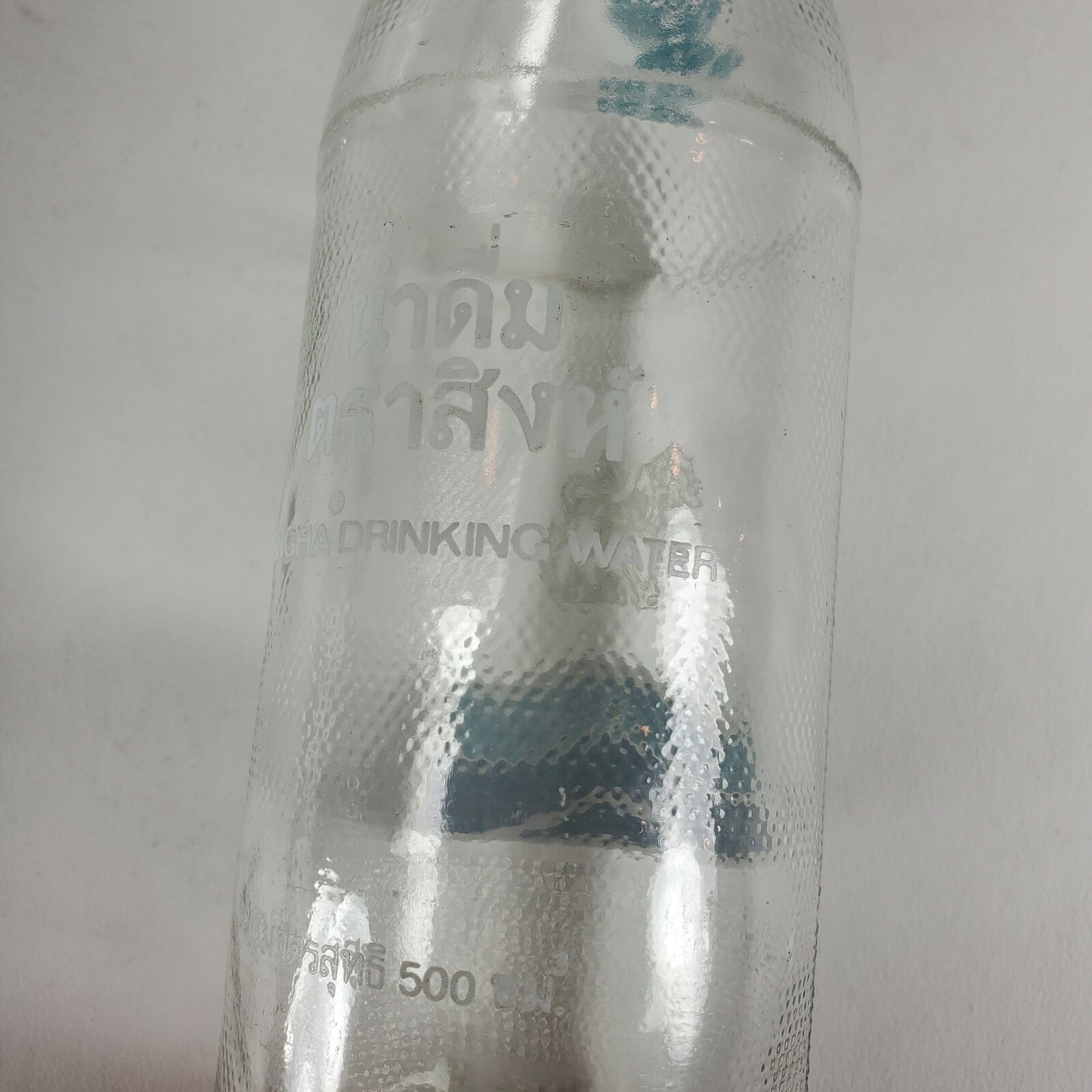 SINGHA DRINKING WATER Thailand Vintage Glass Water Embossed Bottle