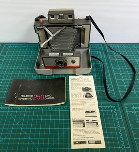 Vintage Polaroid 250 Land Camera and accessories as pictured
