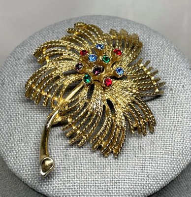 Sarah Coventry Celestial Spray Goldtone Brooch Multi-colored Rhinestones