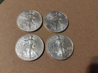 Lot of Four 2014-2016 $1 American Silver Eagle Dollars (A)
