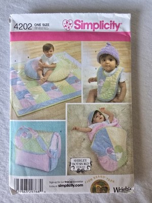 Simplicity 4202 Pattern Baby Accessories Quilt Pillow Cover Wrap Bag Bib Hat NOS