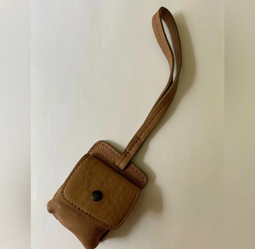Estuche/muñequera de cuero para auriculares nuevos Foto 2 de 3